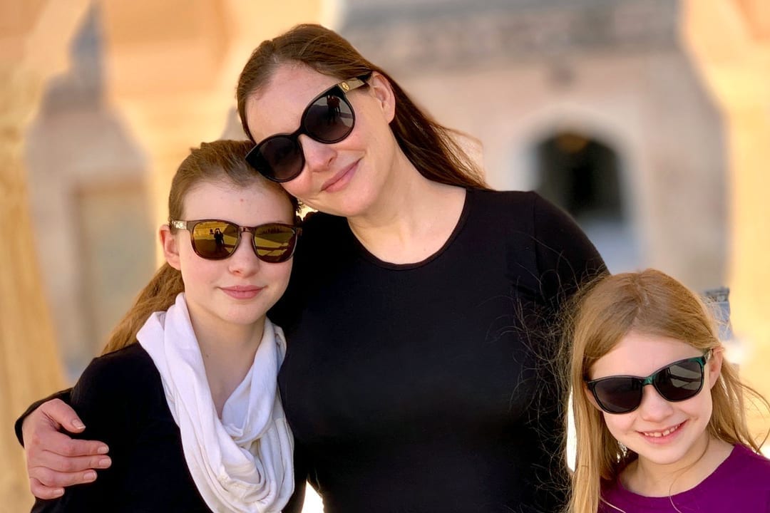 A photo of Sunday Riley and her daughters.