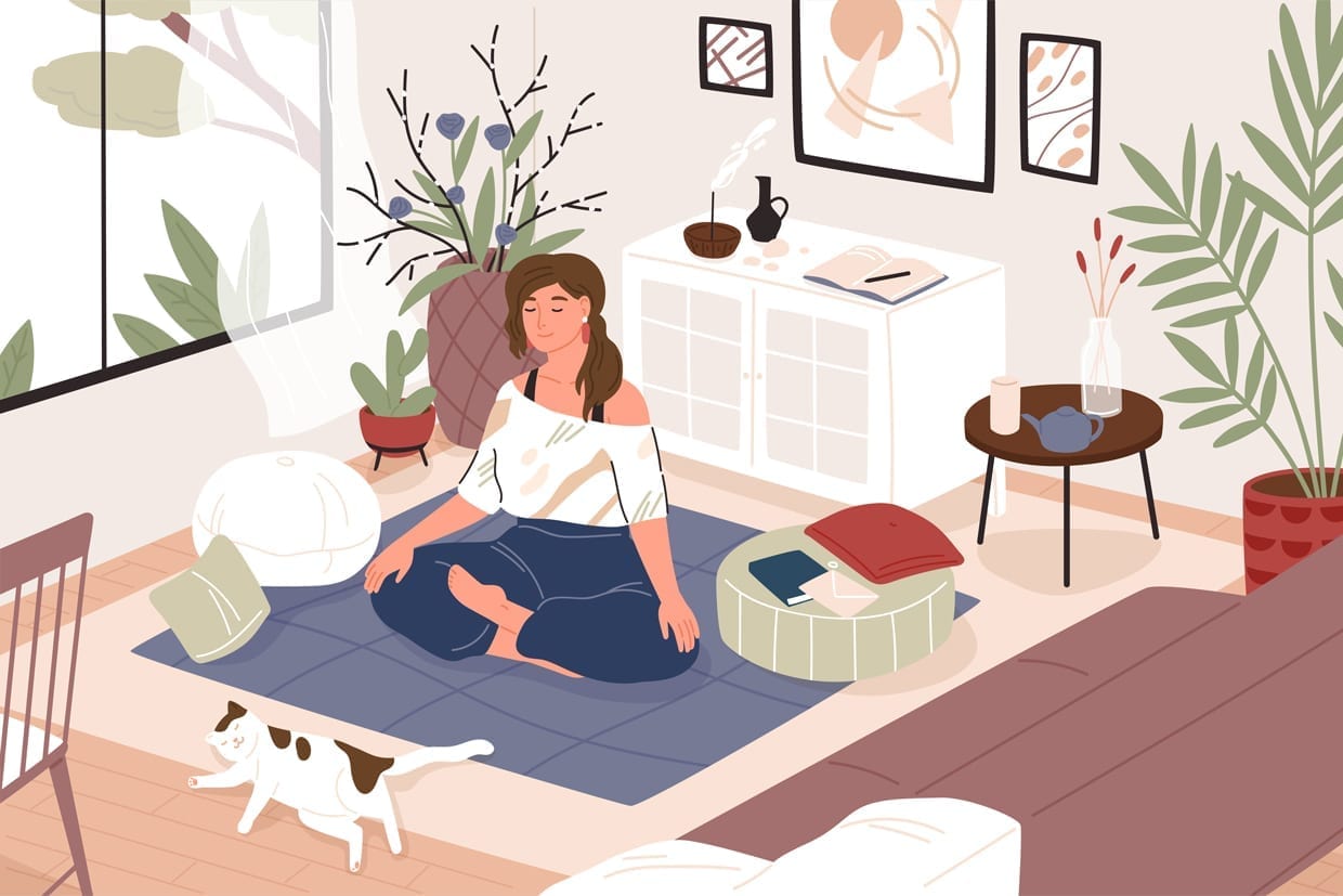 Young woman with crossed legs and closed eyes meditating at home.