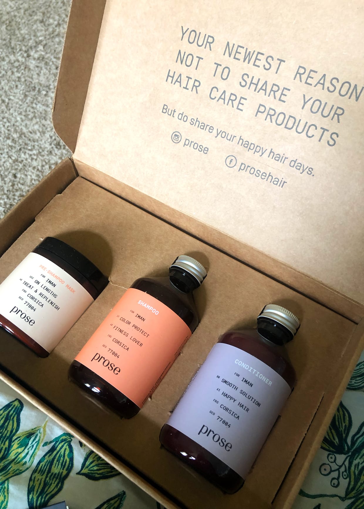 A brown box with a brown jar and two brown bottles.